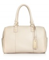 Add a little uptown attitude to your look with this ladylike satchel from Calvin Klein. Buttery-soft leather and gleaming golden hardware provide polish, while the well-organized interior keeps your essentials safe and secure.