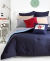 This Midnight Hilfiger Prep sham features a patriotic blue landscape with red accents. The unique combination of allover diamond quilting and signature ribbon elements reflect classic Tommy Hilfiger style.