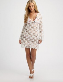 A crochet coverup that is beyond gorgeous.V-neckLong sleevesPull-on stylePolyesterDry cleanMade in USA of imported fabric A crochet coverup that is beyond gorgeous.V-neckLong sleevesPull-on stylePolyesterDry cleanMade in USA of imported fabric