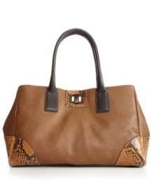 Fall head over heels for this modern girl must-have from Furla. A roomy shopper design crafted from gorgeous leather detailed with python print trim and goldtone hardware. Fall head over heels for this modern girl must-have from Furla. A roomy shopper design crafted from gorgeous leather detailed with python print trim and goldtone hardware.