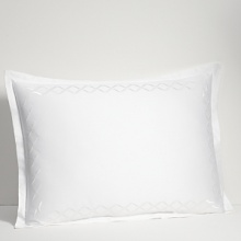 For lovers of fine bed dressing, Ogee Embroidery emulates understated opulence. A sophisticated, contemporary approach to a classic ogee design. Satin stitch and twill texture embroidery create a sleek vertical line. The sham is framed with gently looping corners. For lovers of fine bed dressing, Ogee Embroidery emulates understated opulence. A sophisticated, contemporary approach to a classic ogee design. Satin stitch and twill texture embroidery create a sleek vertical line. The sham is framed with gently looping corners.
