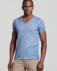 Update your basics with a fashionably worn-in light blue tee from BOSS Orange. Update your basics with a fashionably worn-in light blue tee from BOSS Orange.