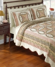 Soothing and casual in lovely shades of pink and green, this Lola quilt boasts textural quilting with a dainty floral motif for a beautiful presentation. Finished with scalloped edges for even more style. Soothing and casual in lovely shades of pink and green, this Lola quilt boasts textural quilting with a dainty floral motif for a beautiful presentation. Finished with scalloped edges for even more style.