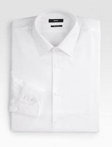 A crisp, slim-fitting classic tailored in fine cotton. ButtonfrontSpread collarCottonDry cleanImported