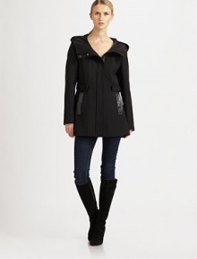 Topped with a roomy hood, this twill-wool coat with leather pockets is destined to stand out from the crowd. Attached hoodConcealed front zipperLeather flap pocketsPrincess seamsFully linedAbout 30 from shoulder to hem51% cotton/32% polyester/17% virgin woolDry clean by leather specialistImported Model shown is 5'11 (180cm) wearing US size Small. Topped with a roomy hood, this twill-wool coat with leather pockets is destined to stand out from the crowd. Attached hoodConcealed front zipperLeather flap pocketsPrincess seamsFully linedAbout 30 from shoulder to hem51% cotton/32% polyester/17% virgin woolDry clean by leather specialistImported Model shown is 5'11 (180cm) wearing US size Small.