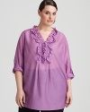 An elegant ruffled neckline softens the rolled-sleeve silhouette in this Tahari Woman look.