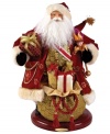 A richly ornamented version of the season's merriest symbol, Santa Claus is draped in lavish gold and burgundy wares in this heirloom figurine from Christopher Radko.