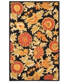 Attractive wildflowers create a sprawling, carefree design upon luxurious, long wool fibers. Woven meticulously in India, the Blossoms area rug from Safavieh presents these florals in bright hues with the modern home in mind. Attractive wildflowers create a sprawling, carefree design upon luxurious, long wool fibers. Woven meticulously in India, the Blossoms area rug from Safavieh presents these florals in bright hues with the modern home in mind.