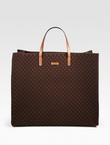 Dark brown Diamante embossed felt with cuir leather trim.Double handles, 5 dropEmbossed leather Gucci tagOpen topInterior metal D ringProtective metal feet18W X 15H X 7½DMade in Italy Dark brown Diamante embossed felt with cuir leather trim.Double handles, 5 dropEmbossed leather Gucci tagOpen topInterior metal D ringProtective metal feet18W X 15H X 7½DMade in Italy