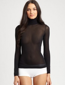 Wear this seductively sheer design on its own or under a blazer for a fresh, modern update. TurtleneckLong sleevesSheer with a hint of sheen92% polyamide/8% elastaneMachine wash or hand washMade in Austria Wear this seductively sheer design on its own or under a blazer for a fresh, modern update. TurtleneckLong sleevesSheer with a hint of sheen92% polyamide/8% elastaneMachine wash or hand washMade in Austria