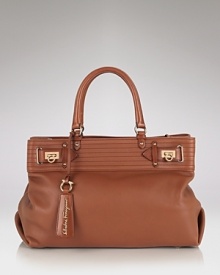 Just right for work or weekend, this soft leather tote captures the signature luxe Salvatore Ferragamo is know for. Just right for work or weekend, this soft leather tote captures the signature luxe Salvatore Ferragamo is know for.
