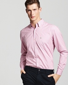 A crisp, clean fit and a fresh shade of pink with white stripes bring a youthful feel to a stylish sport shirt from Lacoste. A crisp, clean fit and a fresh shade of pink with white stripes bring a youthful feel to a stylish sport shirt from Lacoste.