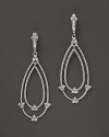 Eloquently shaped, these sterling silver earrings from Judith Ripka are accented with white sapphires.