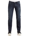 THE LOOKMedium dark wash blue denimNarrow waistband with belt loops and logo button closureFront zipperFive-pocket styleFaded detailsStraight leg silhouetteBack waist logo patchBack pocket decorative stitching THE FITRise, about 9Inseam, about 32THE MATERIAL99% cotton/1% spandexCARE & ORIGINMachine washImported