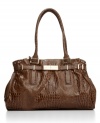 Elegant outside, functional within: the Victoria features croc embossing and triple interior compartments for a smart-chic look that's pure Ivanka Trump.
