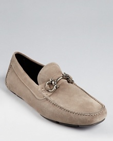 A time-honored design wrought in exceptional Italian suede features a silver-tone Gancini logo buckle across the tongue for an opulent finish. A time-honored design wrought in exceptional Italian suede features a silver-tone Gancini logo buckle across the tongue for an opulent finish.