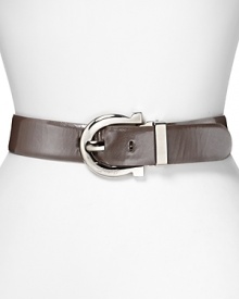 Refine your waistline with Salvatore Ferragamo's reversible leather belt. Wear this style matte for a subtle hit, or flip it over to add a punch of patent.