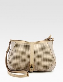 Perforated leather pairs with buttery suede in this slouchy crossbody silhouette.Adjustable crossbody strap, 20-23 dropFlap-lock over top-zip closureOne inside zip pocketTwo inside open pocketsCotton lining15½W X 11H X 2¾DMade in Italy