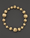 Gleaming beads of textured 18K yellow gold, exclusively for Bloomingdale's from the Marco Bicego Africa collection.