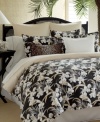 Turn your bedroom into an exotic getaway with this Tommy Bahama Home Julie Cay comforter set. A bounty of floral details take center stage over a dark landscape, evoking the warmth of an evening in the Caribbean.