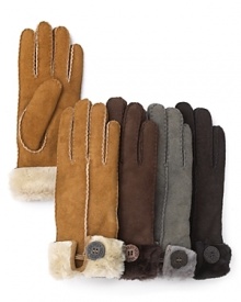 Classic shearling lends cozy style to these cuffed gloves from UGG® Australia. A signature button adds a sophisticated finish. Classic shearling lends cozy style to these cuffed gloves from UGG® Australia. A signature button adds a sophisticated finish.