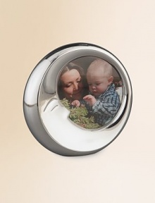 A tender touch for the nursery or nightstand, handcrafted from gleaming alloy in an elongated crescent moon design with sleepy, man-in-the-moon features. Accommodates a 4 diam photograph Wipe clean Imported 