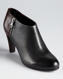 See by Chloé's streamlined two-tone booties showcase a color block construction in subtle, understated hues.