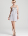 Strips of airy chiffon make this ornately beaded dress from Studio SW by Sue Wong ideal for twirling on the dance floor.