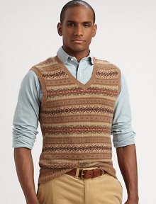 Knit from the finest cotton and cashmere yarns for a smooth hand, this timeless sweater vest is emboldened with a heritage Fair Isle pattern.V-neckRibbed knit collar, sleeves and hem85% cotton/15% cashmereDry cleanImported