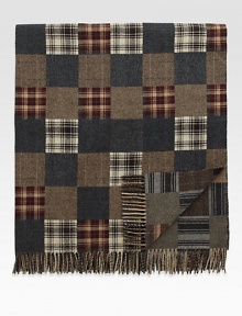 Preppy checks and tartan accents elevate this sophisticated throw crafted from fine Italian wool.Fringed ends55 x 67WoolDry cleanMade in Italy