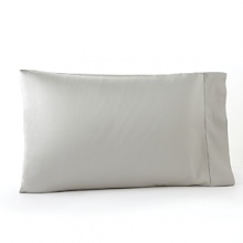 A classic sateen sheet has a luminous sheen and a rich drape. Finished with a crisp, classic hemstitched border. The duvet cover is flanged with hemstitch on three sides with a button closure; the bed skirt is gathered with a plain hem. A classic sateen sheet has a luminous sheen and a rich drape. Finished with a crisp, classic hemstitched border. The duvet cover is flanged with hemstitch on three sides with a button closure; the bed skirt is gathered with a plain hem.