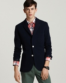 The contrast buttons of this handsome 2-button blazer add whimsy to your refined-and-relaxed look.