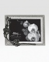 Inspired by the intricacies of natural forms, this graceful frame is richly detailed in cast metal with blackened floral accents. From the Black Orchid CollectionNickel-plate and blackened nickel-plateImportedDIMENSION INFORMATION4 X 6 (6 X 8 overall)5 X 7 (7 X 8 overall)8 X 10 (10 X 12 overall)