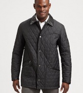 Sleek leather trim adds a modern update to this soft, quilted style.Point leather collarButton frontZip pocketsSlash pocketsAbout 35 from shoulder to hemPolyesterLeather trimDry clean by a leather specialistMade in Italy