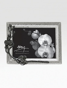 Inspired by the intricacies of natural forms, this graceful frame is richly detailed in cast metal with blackened floral accents. From the Black Orchid CollectionNickel-plate and blackened nickel-plateImportedDIMENSION INFORMATION4 X 6 (6 X 8 overall)5 X 7 (7 X 8 overall)8 X 10 (10 X 12 overall) Inspired by the intricacies of natural forms, this graceful frame is richly detailed in cast metal with blackened floral accents. From the Black Orchid CollectionNickel-plate and blackened nickel-plateImportedDIMENSION INFORMATION4 X 6 (6 X 8 overall)5 X 7 (7 X 8 overall)8 X 10 (10 X 12 overall)