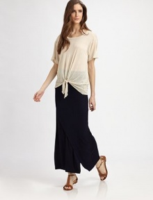 Lengthy, fitted go-to has an elastic waistband and asymmetrical seaming that complements any frame. Elastic waistbandAsymmetrical seamingFront side slit96% modal/4% spandexMachine washMade in USAModel shown is 5'9½ (176cm) wearing US size Small. Lengthy, fitted go-to has an elastic waistband and asymmetrical seaming that complements any frame. Elastic waistbandAsymmetrical seamingFront side slit96% modal/4% spandexMachine washMade in USAModel shown is 5'9½ (176cm) wearing US size Small.