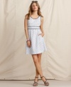 Rendered from breezy cotton, this chic dress from Tommy Hilfiger is a springtime classic. Allover polka dots and bows at the back make for prepped-up style, no matter the occasion!