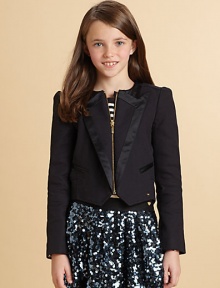 A tux deluxe for your little lass, complete with a swallowtail hem.Jewel necklineZip frontSatin-edged peaked lapelsSatin-piped welt pocketsLong sleeves with button detailed cuffsButtoned belt at back waistCotton/SpandexDry cleanImported A tux deluxe for your little lass, complete with a swallowtail hem.Jewel necklineZip frontSatin-edged peaked lapelsSatin-piped welt pocketsLong sleeves with button detailed cuffsButtoned belt at back waistCotton/SpandexDry cleanImported