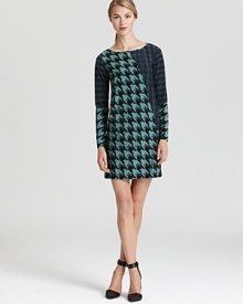 Patchwork houndstooth prints infuse a classic silhouette with modern style. Shift dress by Tibi.