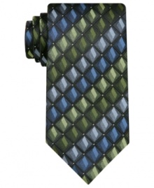 With a pleasing palette and a geometric pattern, this John Ashford tie is a treat for the eyes. With a pleasing palette and a geometric pattern, this John Ashford tie is a treat for the eyes.