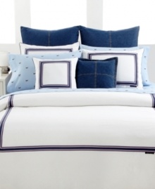 Classic style, totally Tommy. Boasting pure white cotton embellished with navy, white and red striping, the White Oxford duvet cover gives your bed a polished look with a preppy edge. Featuring a striped reverse; mitered corner stitching; button closure.