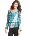 The peasant top goes modern with a bold, graphic print in this Ellen Tracy look.