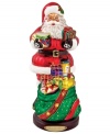 Up to his beard in gifts, the Toy Santa figurine is the essence of holiday cheer. Handcrafted glass is brilliantly painted with glittering detail in classic Christopher Radko style.