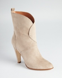 An effortless pull-on silhouette from Sigerson Morrison is rendered in soft suede and a classic hue.