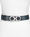 Constructed in rich leather and accented by bold hardware, this reversible belt from Salvatore Ferragamo adds polished versatility to every look.