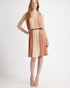 A romantic, lightweight dress with delicately woven pleats in soft, neutral tones. JewelneckSolid inserts on shouldersWide shoulder strapsAllover narrow color-blocked pleatsElastic waist with solid bandAbout 23 from natural waistPolyesterDry cleanImportedModel shown is 5'10 (177cm) wearing US size 4.