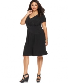 Look slender and sensational with Elementz' short sleeve plus size dress, featuring a flattering crisscross front and slimming panel-- wear it from day to play!