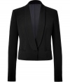 Get the of-the-moment look with this chic cropped blazer from Joseph - Narrow lapels, zipper and single button front closure, cropped silhouette, front slit pockets - Style with a tie-neck blouse, cropped skinny trousers, and platform heels