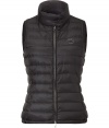 Lightweight and stylish, this quilted down Vest will keep you looking chic from season-to-season - Stand collar with snap detail, front zip closure, zip pockets, all-over quilt detail - Pair with jeans, wide leg trousers, or a mini-dress with ribbed tights
