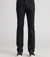 A clean wash with a matte finish and subtle abrasions is tailored with slim, tapered legs in dressed-up Italian denim. Five-pocket style Zip fly Inseam, about 33 Machine wash Made in USA